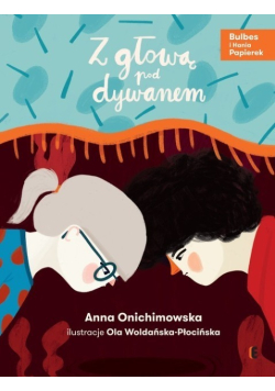 Z głową pod dywanem